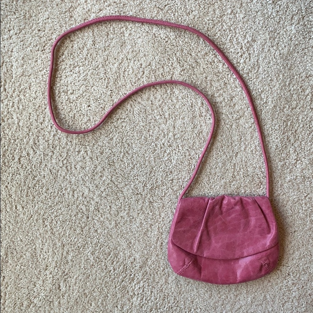 Pink leather FOSSIL crossbody bag.